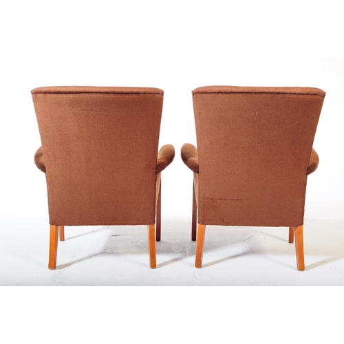 618 - Parker Knoll - A pair of mid 20th century Parker Knoll PK 749 open lounge armchairs. The chairs havi... 