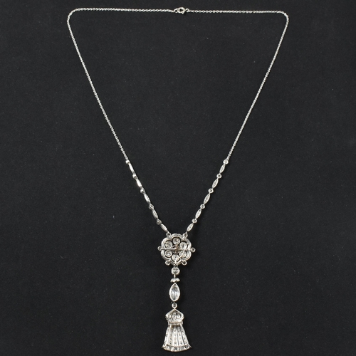 1 - A cased Edwardian platinum and diamond pendant necklace. The necklace strung with an articulating ta... 