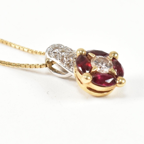 106 - An Italian 18ct gold, ruby and diamond target pendant necklace. The 18ct yellow gold box chain neckl... 