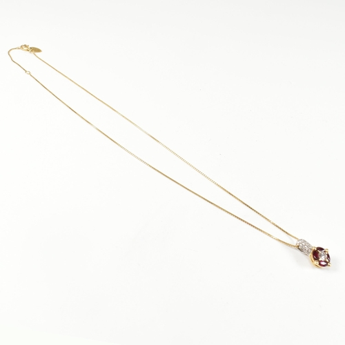 106 - An Italian 18ct gold, ruby and diamond target pendant necklace. The 18ct yellow gold box chain neckl... 