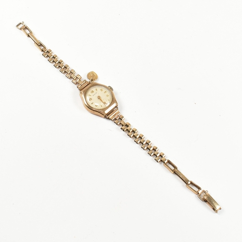 107 - A 1960s hallmarked 9ct gold cased Avia wristwatch. The watch having a rolled gold strap with a hallm... 