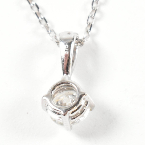 111 - A hallmarked white gold and diamond solitaire pendant necklace. The necklace hallmarked for Sheffiel... 