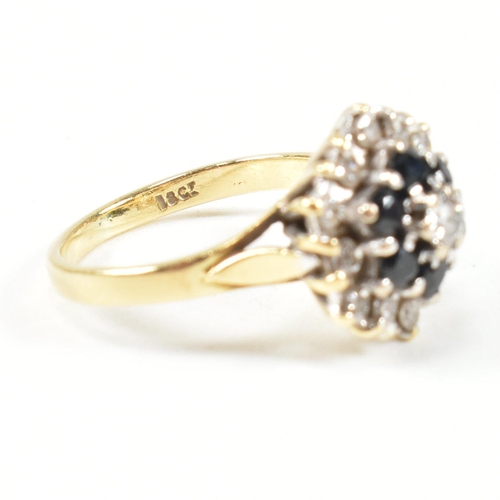 118 - An 18ct gold, sapphire and diamond cluster ring. Marked 18ct. Size J.5. Weight 4.7g. All weights, me... 