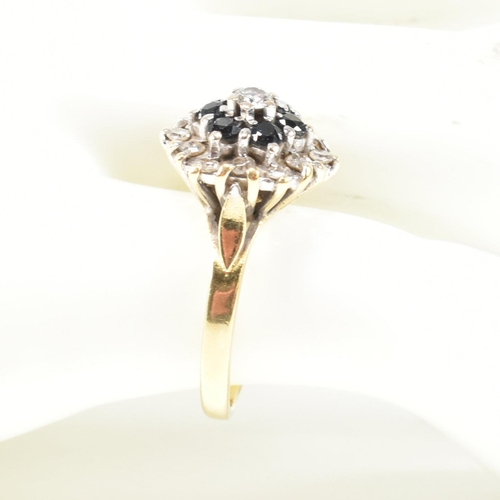 118 - An 18ct gold, sapphire and diamond cluster ring. Marked 18ct. Size J.5. Weight 4.7g. All weights, me... 