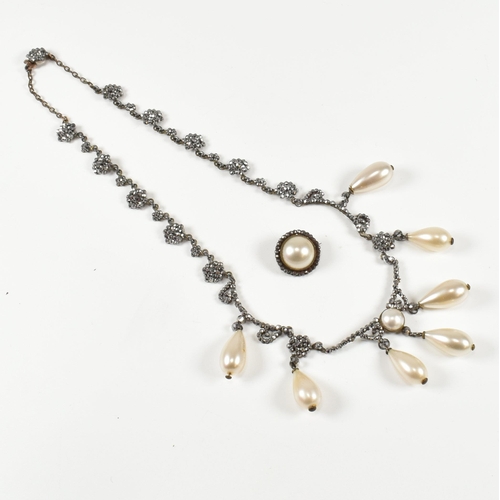 125 - A cased 19th century Victorian cut steel and simulated pearl festoon necklace and brooch parure . Th... 