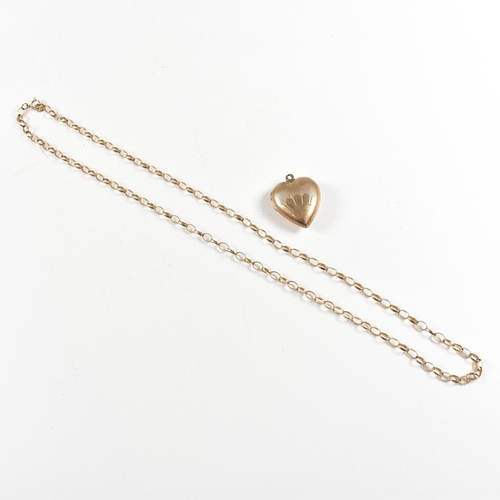 126 - A hallmarked 9ct gold oval link chain 3.98g, together with a 9ct back and front heart locket 3.25g. ... 