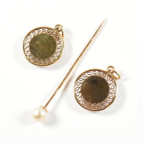 127 - A 9ct and pearl stick pin together with two 12ct Gold filled service medals set with synthetic ruby ... 