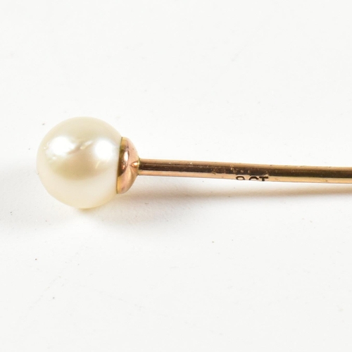 127 - A 9ct and pearl stick pin together with two 12ct Gold filled service medals set with synthetic ruby ... 