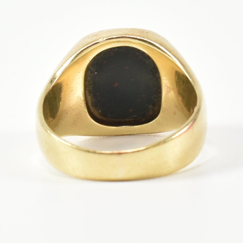 131 - A 14ct gold and bloodstone intaglio signet ring. The ring set with a bloodstone intaglio seal depict... 