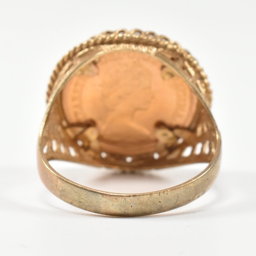 133 - A hallmarked 9ct gold and half sovereign signet ring. The ring set with a half sovereign dated 1982 ... 