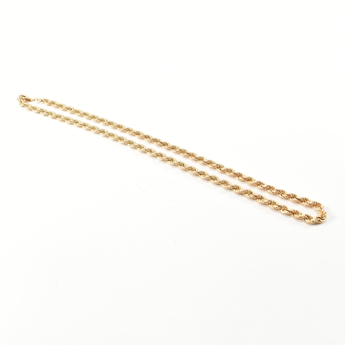 135 - A hallmarked 9ct gold rope chain necklace. The gold necklace hallmarked for Sheffield together with ... 