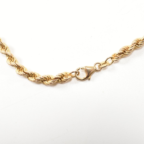 135 - A hallmarked 9ct gold rope chain necklace. The gold necklace hallmarked for Sheffield together with ... 