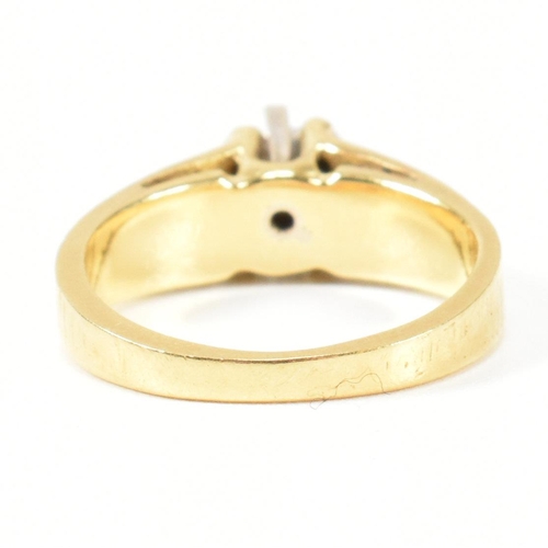 136 - A hallmarked 18ct gold and diamond solitaire ring. The ring having a single six claw set round brill... 