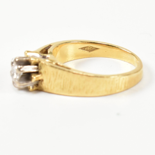 136 - A hallmarked 18ct gold and diamond solitaire ring. The ring having a single six claw set round brill... 