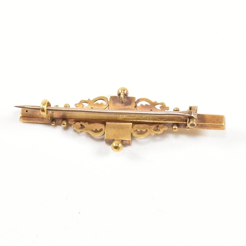 149 - An Edwardian hallmarked 15ct gold and gem set bar brooch pin. The brooch pin set with two round cut ... 