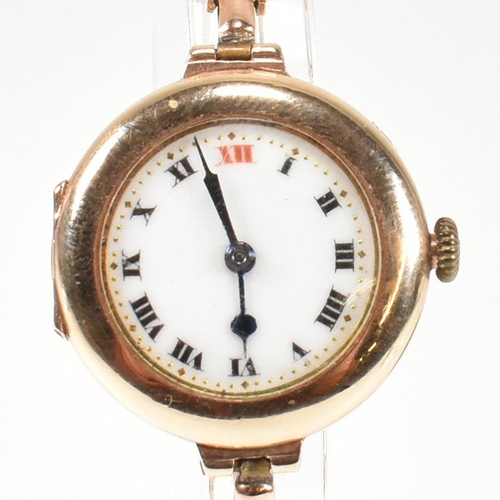 154 - A hallmarked 9ct gold watch with expanding bracelet strap. The gold watch having an enamel dial with... 