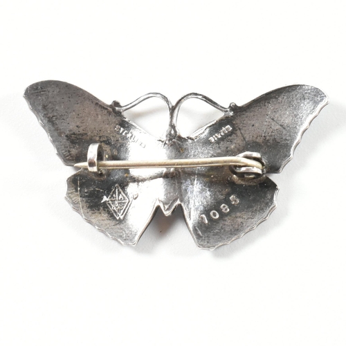 155 - Early 20th century guilloche enamel butterfly brooch. The silver butterfly brooch pin having blue gu... 