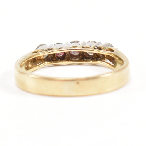 163 - A gold and diamond five stone ring. The ring having a single row of five shared claw set round brill... 