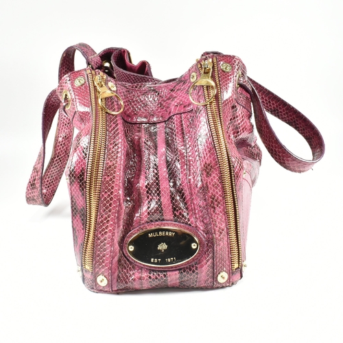 167 - A Mulberry 'Poppy' pink snakeskin handbag. The Mulberry bag having a raspberry snakeskin exterior wi... 