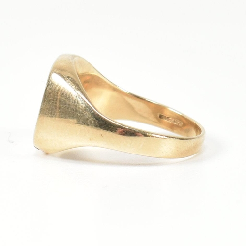 170 - A hallmarked 9ct gold signet seal ring with dragon intaglio. The signet ring having a flat cushion s... 