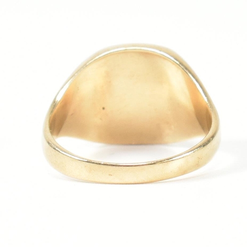 170 - A hallmarked 9ct gold signet seal ring with dragon intaglio. The signet ring having a flat cushion s... 