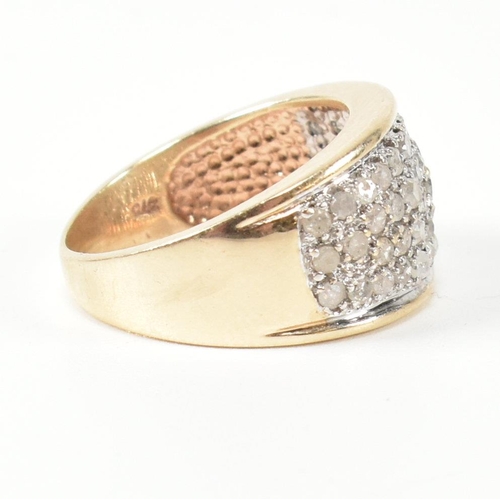 182 - A hallmarked 9ct gold and diamond ring. The 9ct gold ring set with fifty one round cut pave set diam... 