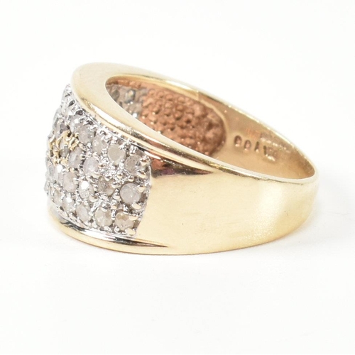 182 - A hallmarked 9ct gold and diamond ring. The 9ct gold ring set with fifty one round cut pave set diam... 