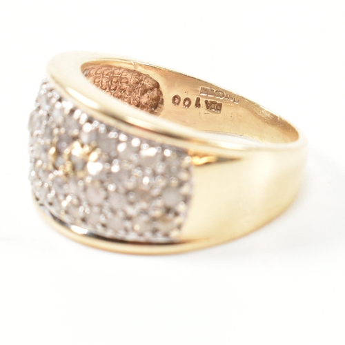 182 - A hallmarked 9ct gold and diamond ring. The 9ct gold ring set with fifty one round cut pave set diam... 