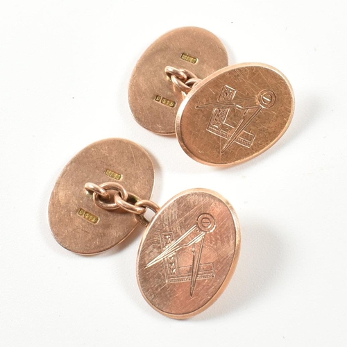 184 - A pair of early 20th century 9ct gold Masonic cufflinks. The chain style cufflinks having canted ova... 