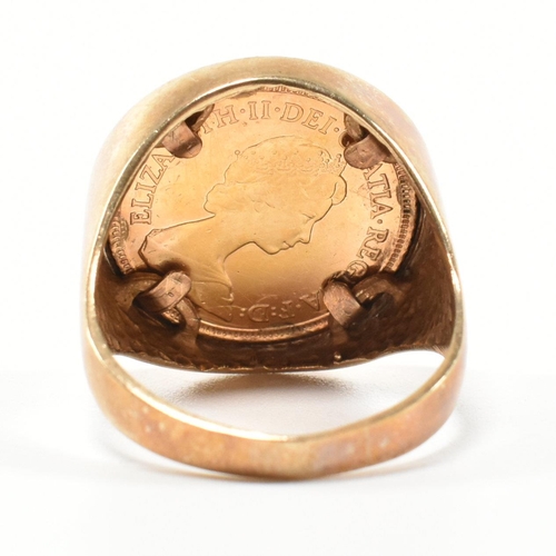 187 - A hallmarked 9ct gold and half sovereign mounted signet ring. The ring set with a half sovereign dat... 