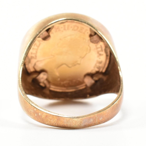 187 - A hallmarked 9ct gold and half sovereign mounted signet ring. The ring set with a half sovereign dat... 