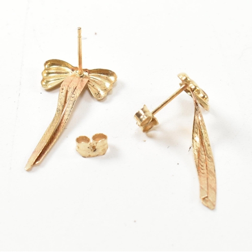 188 - A pair of 9ct gold snake chain bow earrings and two 9ct gold bracelets. The lot to include a pair of... 