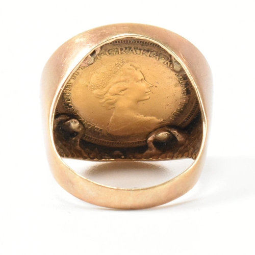 19 - A hallmarked 9ct gold and full sovereign mounted signet ring. The ring set with a full sovereign dat... 