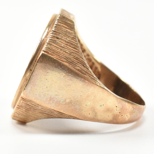 195 - A hallmarked 9ct gold signet ring having an onyx plaque with incised gilded cannabis leaf motif havi... 