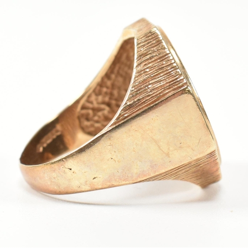 195 - A hallmarked 9ct gold signet ring having an onyx plaque with incised gilded cannabis leaf motif havi... 