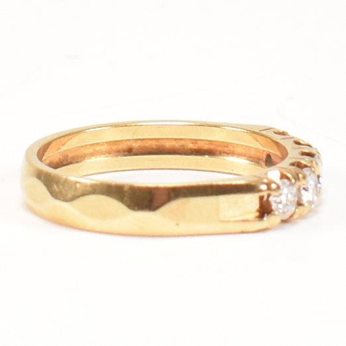 197 - An 18ct gold and diamond five stone ring. The ring having five round brilliant cut diamonds to facet... 