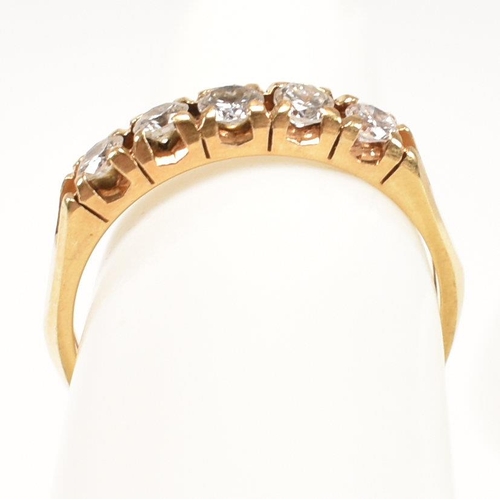 197 - An 18ct gold and diamond five stone ring. The ring having five round brilliant cut diamonds to facet... 