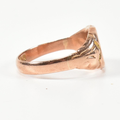 198 - An early 20th century hallmarked 9ct rose gold shield signet ring. The 9ct rose gold signet ring hav... 