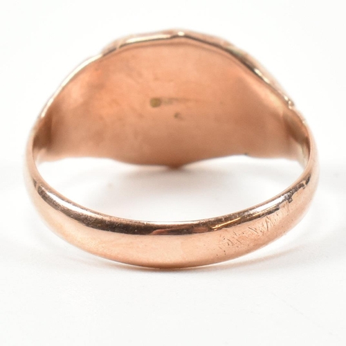 198 - An early 20th century hallmarked 9ct rose gold shield signet ring. The 9ct rose gold signet ring hav... 