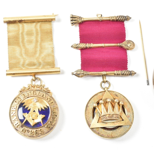 199 - A collection of Masonic jewel medals. The medals to include A hallmarked silver medal with crown mot... 