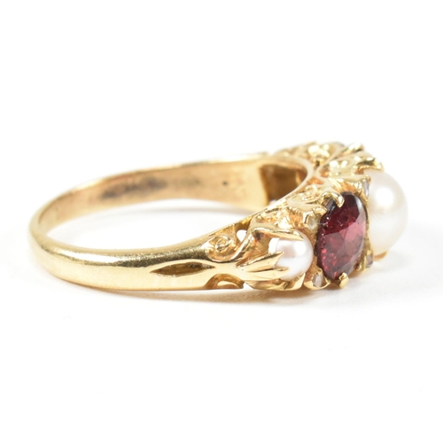 20 - A gold pearl and garnet and diamond five stone ring. The ring set with three half pearls and two rou... 