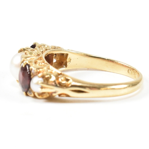 20 - A gold pearl and garnet and diamond five stone ring. The ring set with three half pearls and two rou... 