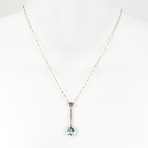 203 - A 9ct gold and blue paste pendant necklace together with a 9ct gold and seed pearl brooch pin. The 9... 