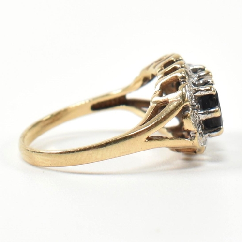 206 - A 9ct gold, sapphire and diamond three stone ring. The ring set with three graduating oval cut sapph... 