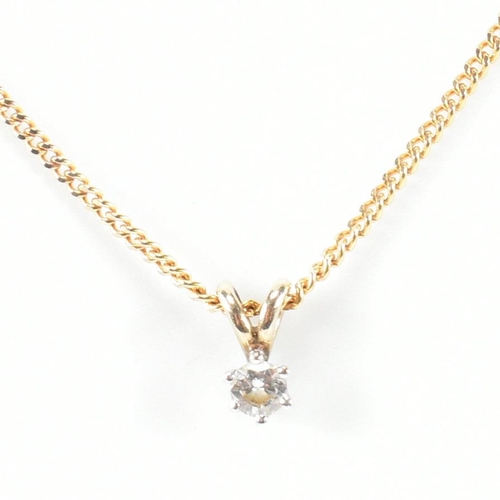 208 - A hallmarked 9ct gold and diamond pendant necklace. The 9ct gold curb link chain necklace strung wit... 