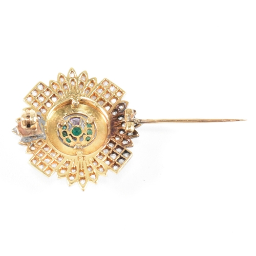 21 - An early 20th century military interest Scots Guards 18ct gold emerald and amethyst and diamond broo... 