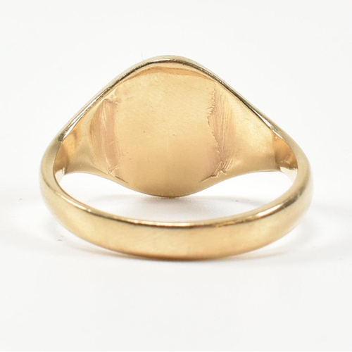 210 - A hallmarked 9ct gold signet ring. The 9ct gold signet ring having an oval face with tapered shoulde... 