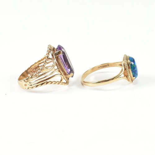 220 - A hallmarked 9ct gold and amethyst ring and a hallmarked 9ct gold and synthetic opal ring. The dress... 