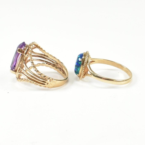 220 - A hallmarked 9ct gold and amethyst ring and a hallmarked 9ct gold and synthetic opal ring. The dress... 