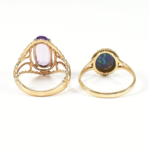 220 - A hallmarked 9ct gold and amethyst ring and a hallmarked 9ct gold and synthetic opal ring. The dress... 